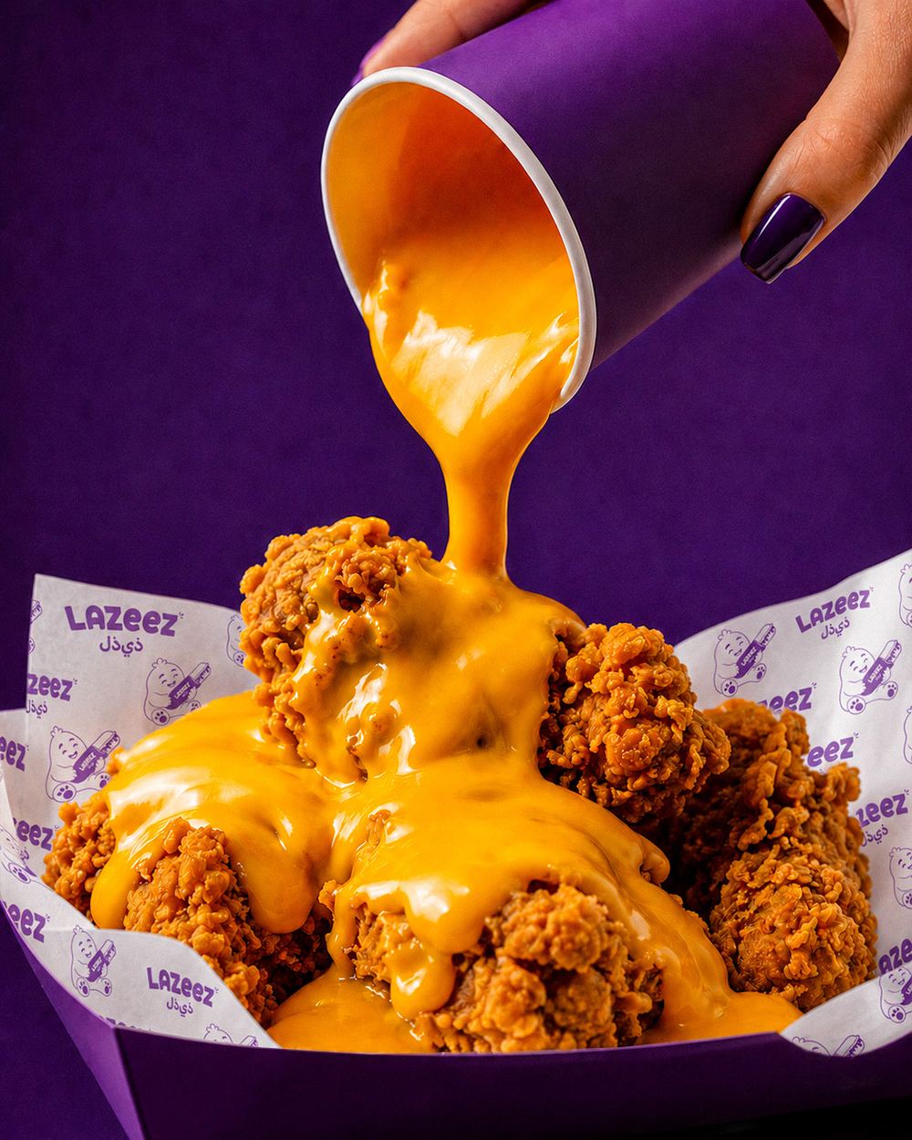 Firecracker Wings served with a tray of Lazeez signature sauces